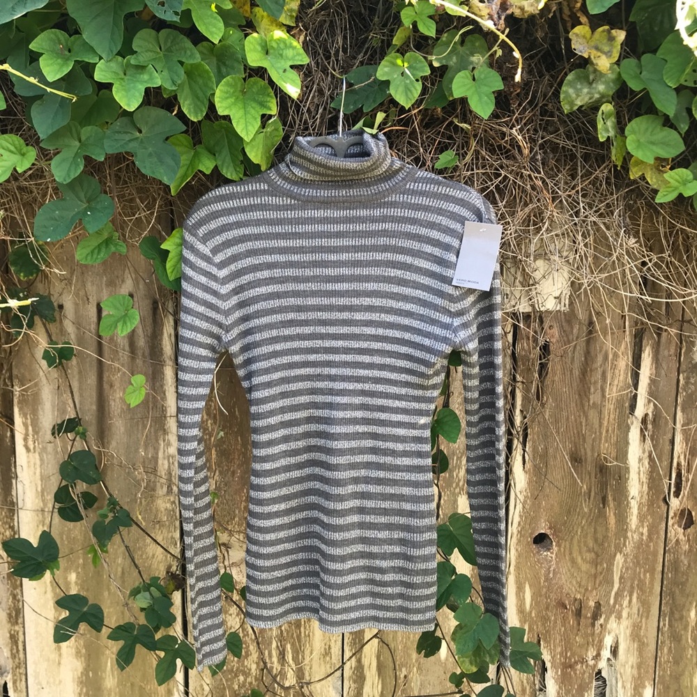 Charcoal gray striped turtle neck sweater.